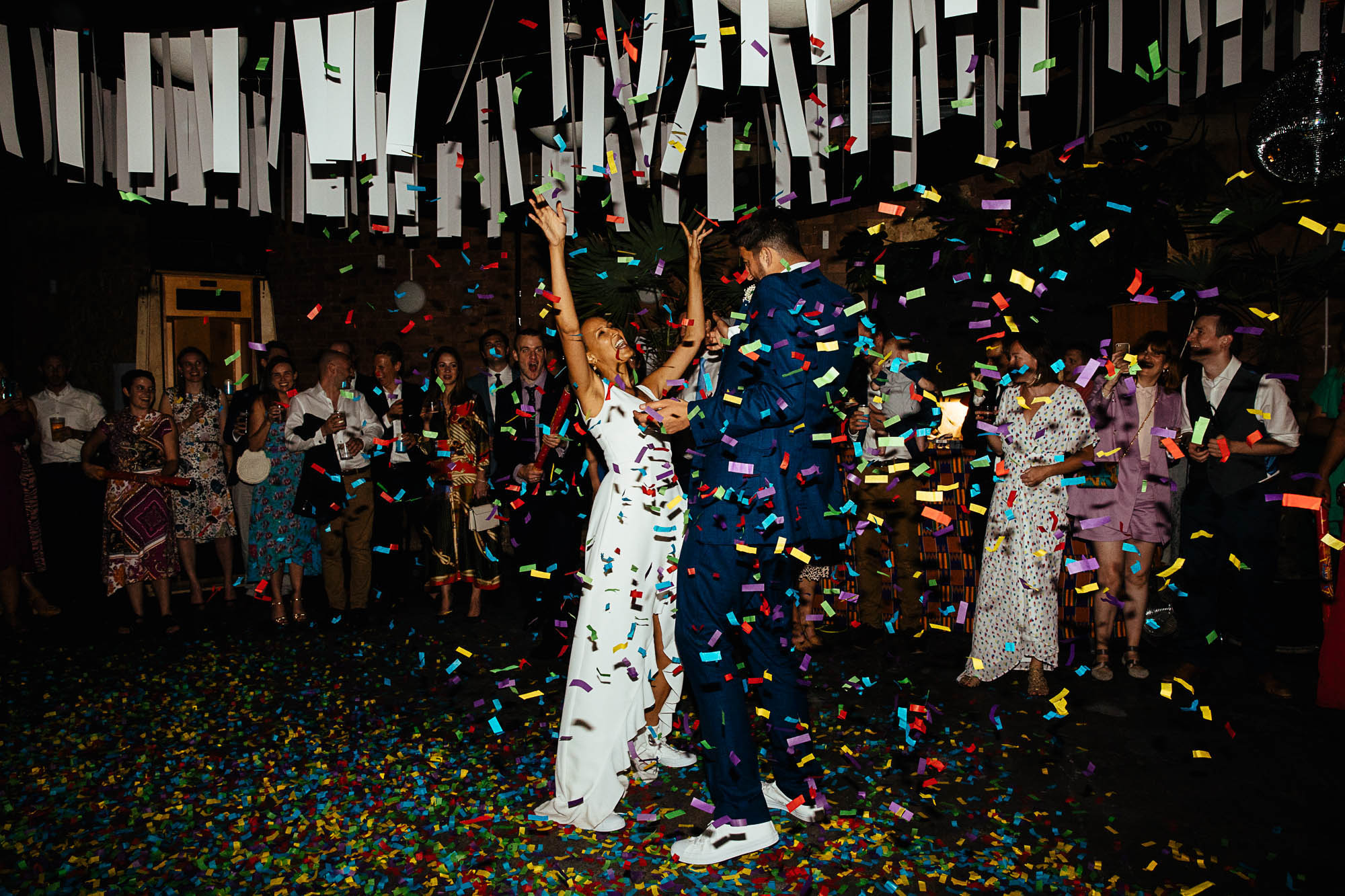 couple have the first dance with confetti canon